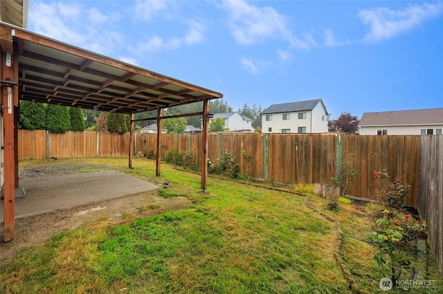 1105 200th Street Ct E, Spanaway, WA 98387 - view of yard with a patio and a carport
