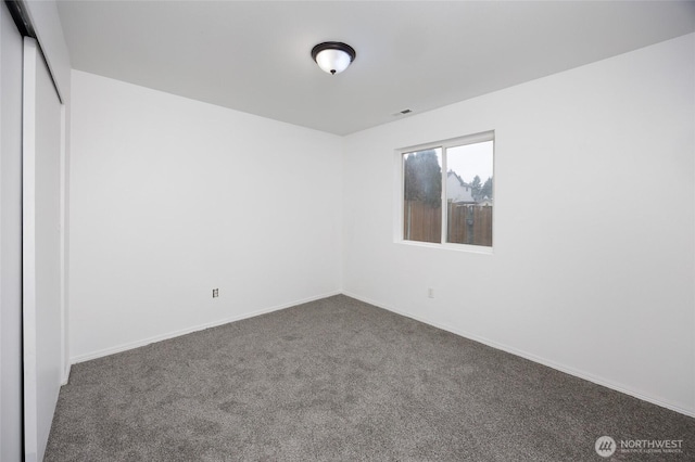 1105 200th Street Ct E, Spanaway, WA 98387 - spare room featuring carpet floors and baseboards