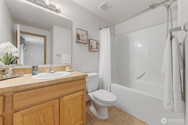 8432 Pepperidge Ln SE, Yelm, WA 98597 - bathroom featuring vanity, toilet, and shower / bath combo with shower curtain