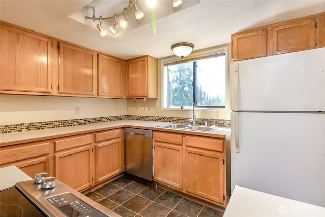 7620 194th Ave E, Bonney Lake, WA 98391 - kitchen with freestanding refrigerator, stainless steel dishwasher, light countertops, and decorative backsplash