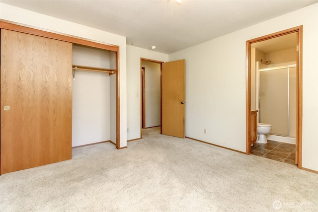 7620 194th Ave E, Bonney Lake, WA 98391 - unfurnished bedroom featuring carpet floors, a closet, and connected bathroom