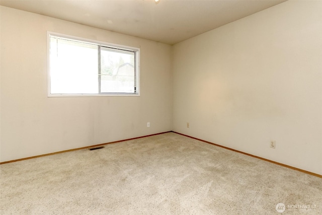 7620 194th Ave E, Bonney Lake, WA 98391 - carpeted spare room featuring baseboards