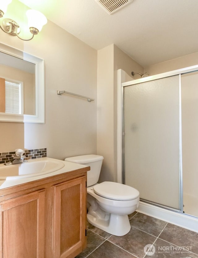 7620 194th Ave E, Bonney Lake, WA 98391 - full bath with vanity, a shower stall, tile patterned flooring, and backsplash