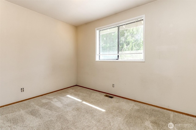7620 194th Ave E, Bonney Lake, WA 98391 - carpeted empty room with baseboards