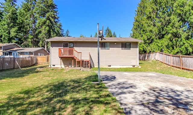 7620 194th Ave E, Bonney Lake, WA 98391 - back of house with crawl space, a fenced backyard, and a patio