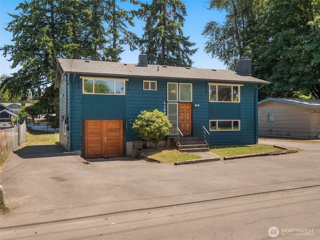 11822 10th Ave S, Seattle, WA 98168 - view of front of home with a chimney