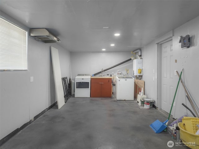 11822 10th Ave S, Seattle, WA 98168 - garage with an AC wall unit, separate washer and dryer, water heater, and recessed lighting