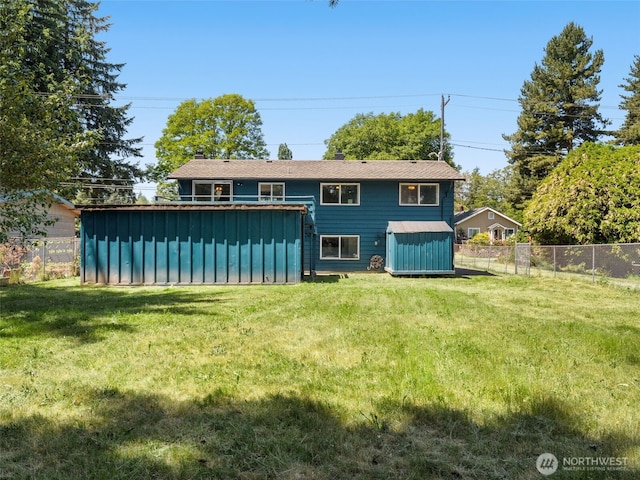 11822 10th Ave S, Seattle, WA 98168 - rear view of property featuring a shed and a chimney