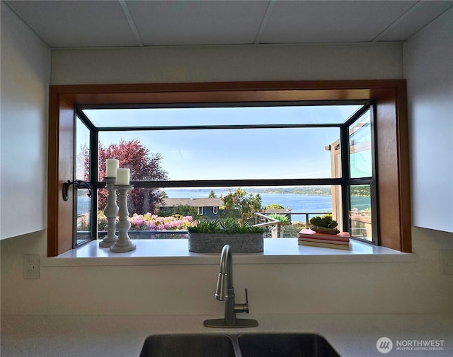 714 SW 296th St, Federal Way, WA 98023 - kitchen featuring a sink and a water view