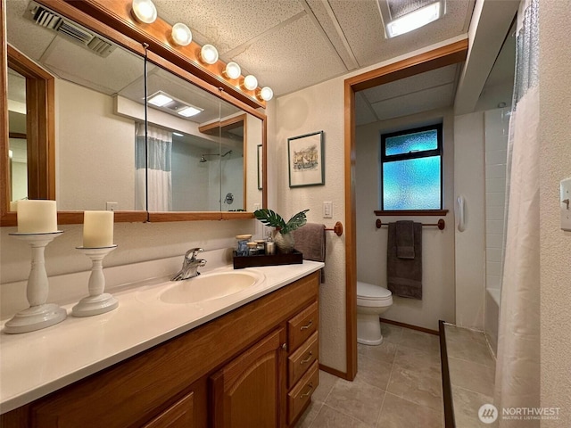 714 SW 296th St, Federal Way, WA 98023 - full bathroom with vanity, tile patterned floors, toilet, shower / bath combination with curtain, and a paneled ceiling