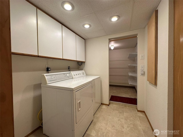 714 SW 296th St, Federal Way, WA 98023 - washroom featuring washer and clothes dryer, cabinet space, baseboards, recessed lighting, and light tile patterned flooring