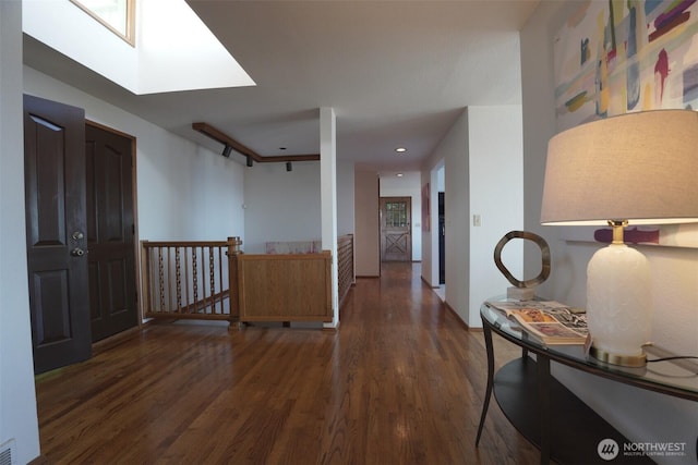 714 SW 296th St, Federal Way, WA 98023 - hallway featuring wood finished floors, a skylight, an upstairs landing, and recessed lighting