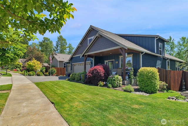 431 Timberland Loop, Mount Vernon, WA 98273 - view of front of house with board and batten siding and a garage