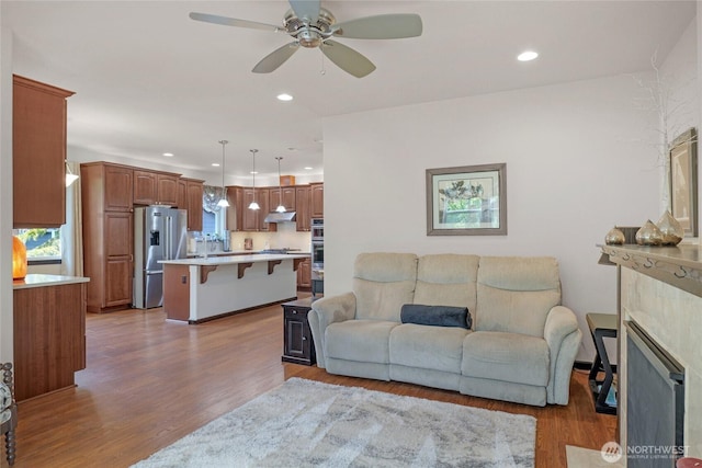 431 Timberland Loop, Mount Vernon, WA 98273 - living area with ceiling fan, wood finished floors, and recessed lighting