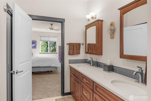 431 Timberland Loop, Mount Vernon, WA 98273 - bathroom featuring double vanity, ensuite bathroom, and ceiling fan