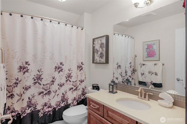 431 Timberland Loop, Mount Vernon, WA 98273 - full bathroom with toilet, vanity, tasteful backsplash, and a shower with curtain