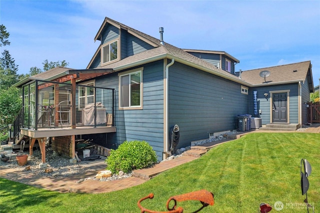 431 Timberland Loop, Mount Vernon, WA 98273 - rear view of house with a lawn, a wooden deck, central air condition unit, and a shingled roof