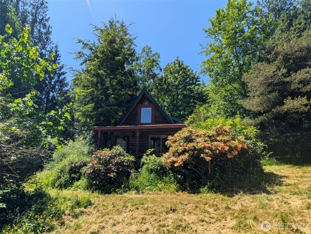 12508 Kellogg Lake Rd, Sultan, WA 98294 - view of property exterior featuring a forest view