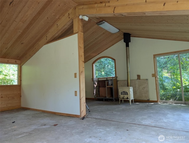 12508 Kellogg Lake Rd, Sultan, WA 98294 - bonus room with a wood stove, plenty of natural light, lofted ceiling, concrete floors, and wooden ceiling