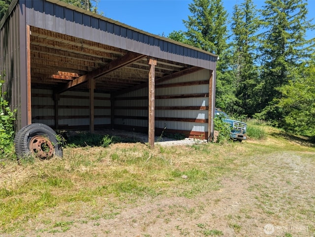 12508 Kellogg Lake Rd, Sultan, WA 98294 - view of pole building featuring a detached carport
