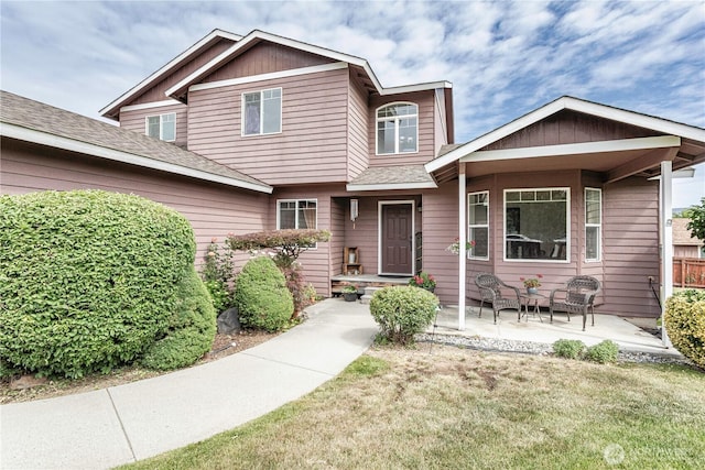1649 Denise Cir, Wenatchee, WA 98801 - view of front facade featuring roof with shingles and a front lawn