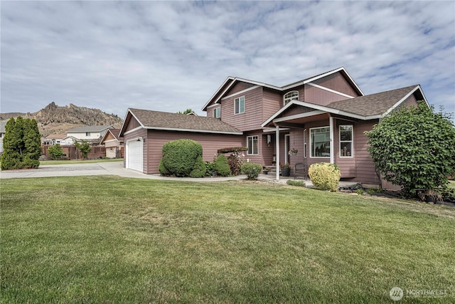 1649 Denise Cir, Wenatchee, WA 98801 - view of front of house with an attached garage, concrete driveway, and roof with shingles