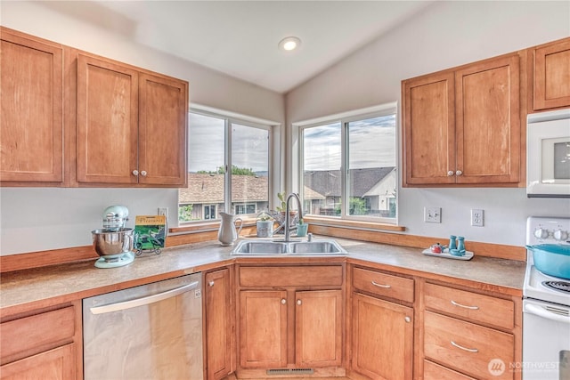 1649 Denise Cir, Wenatchee, WA 98801 - kitchen featuring white appliances, a sink, lofted ceiling, recessed lighting, and brown cabinetry