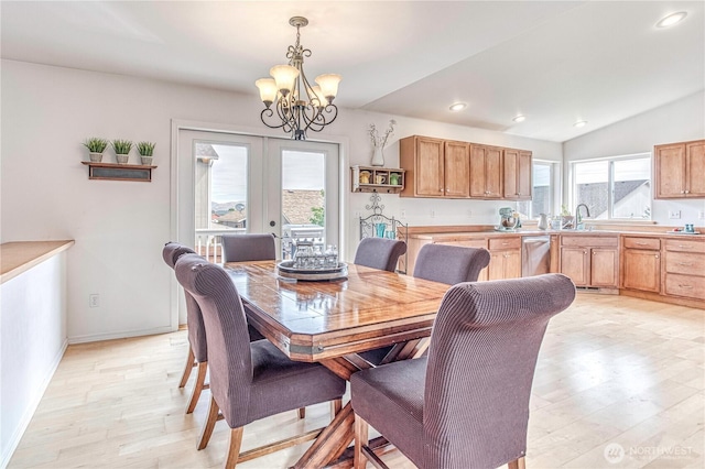 1649 Denise Cir, Wenatchee, WA 98801 - dining room with light wood-style flooring, a chandelier, recessed lighting, vaulted ceiling, and baseboards