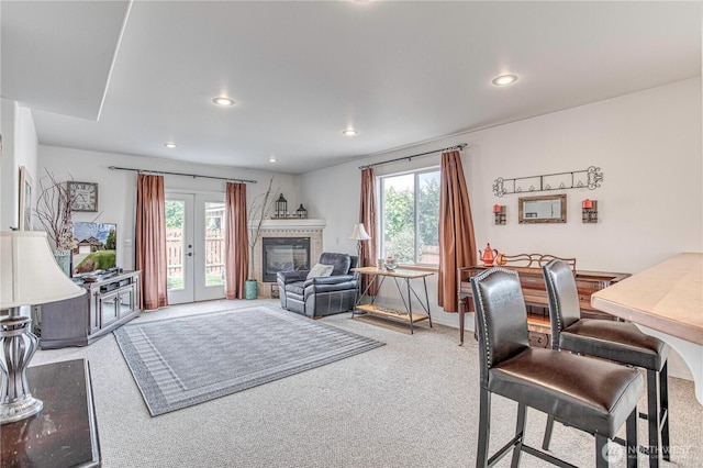 1649 Denise Cir, Wenatchee, WA 98801 - living room with carpet floors, plenty of natural light, recessed lighting, and a tile fireplace