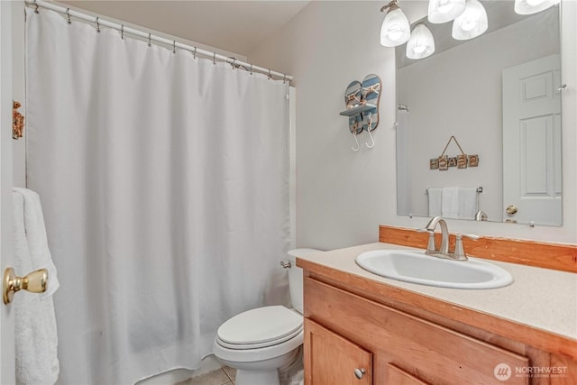1649 Denise Cir, Wenatchee, WA 98801 - bathroom featuring vanity, toilet, and tile patterned flooring