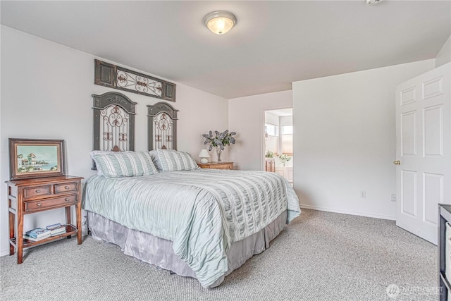 1649 Denise Cir, Wenatchee, WA 98801 - bedroom with light carpet, baseboards, and ensuite bath