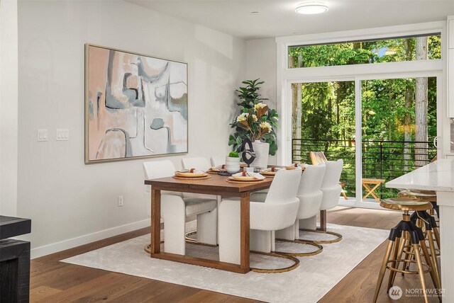 19722 Filbert Dr Unit B-3, Bothell, WA 98012 - dining space featuring wood finished floors and baseboards