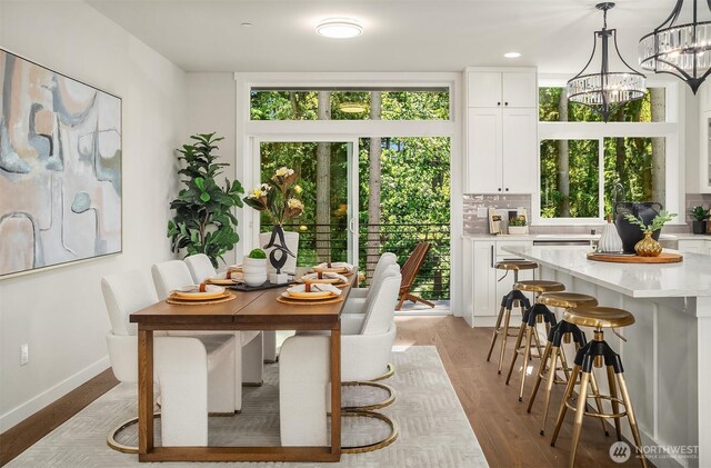 19722 Filbert Dr Unit B-3, Bothell, WA 98012 - dining space with a chandelier, light wood-style flooring, baseboards, and recessed lighting