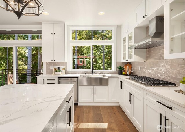 19722 Filbert Dr Unit B-3, Bothell, WA 98012 - kitchen with appliances with stainless steel finishes, wall chimney range hood, wood finished floors, white cabinets, and recessed lighting