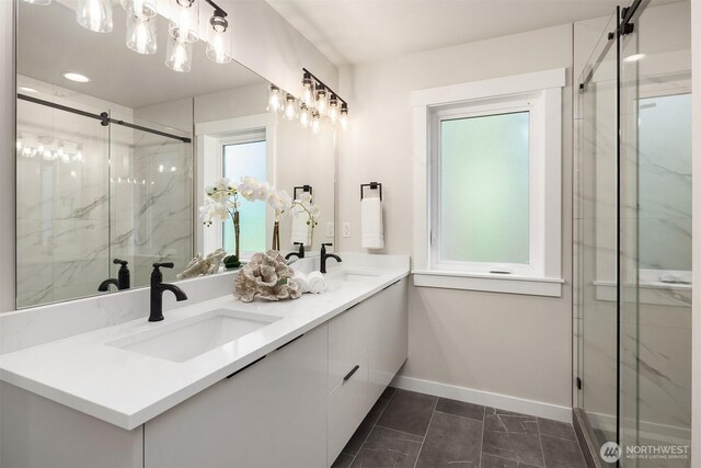 19722 Filbert Dr Unit B-3, Bothell, WA 98012 - full bath with double vanity, baseboards, a marble finish shower, and tile patterned floors