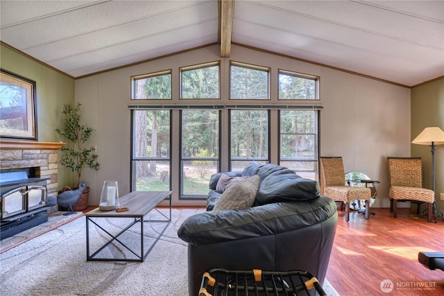 1851 Washington Dr, Point Roberts, WA 98281 - living room with wood finished floors, a wood stove, and crown molding