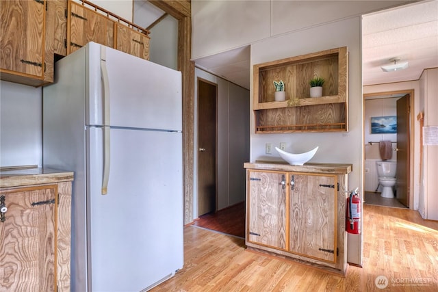 1851 Washington Dr, Point Roberts, WA 98281 - kitchen featuring freestanding refrigerator and light wood-type flooring
