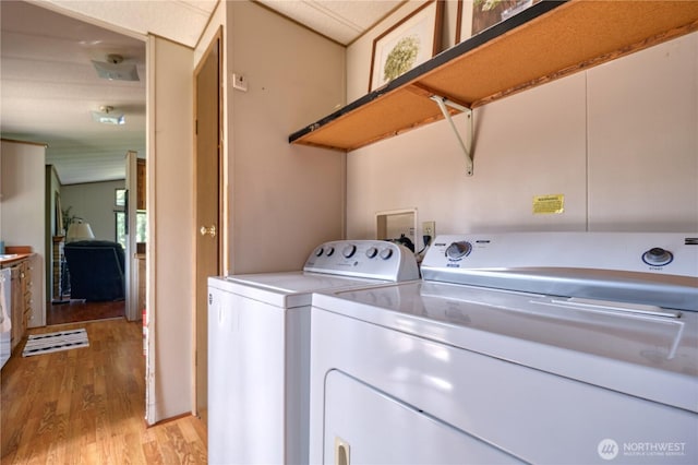1851 Washington Dr, Point Roberts, WA 98281 - laundry area with light wood finished floors and independent washer and dryer