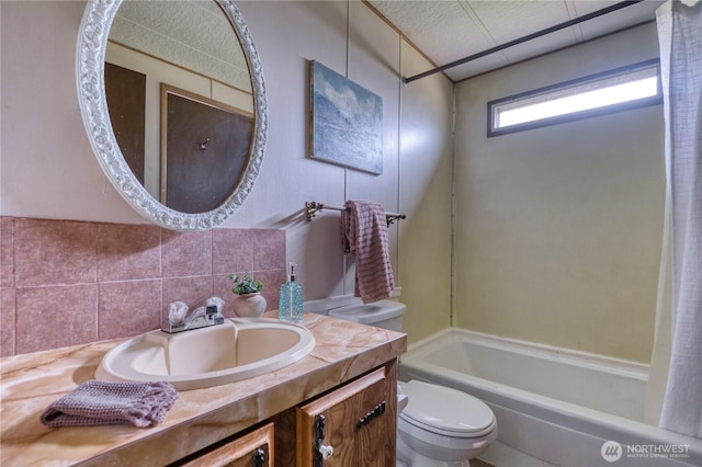 1851 Washington Dr, Point Roberts, WA 98281 - full bathroom with toilet, vanity, tasteful backsplash, and shower / bath combo