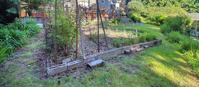 19640 SE 29th St, Sammamish, WA 98075 - view of grassy yard with a garden and a wooden deck