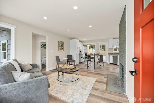 8206 N Way SW, Lakewood, WA 98498 - living area with recessed lighting, light wood-style floors, and baseboards