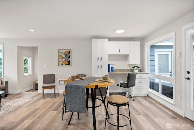 8206 N Way SW, Lakewood, WA 98498 - dining room with light wood-type flooring, recessed lighting, and baseboards