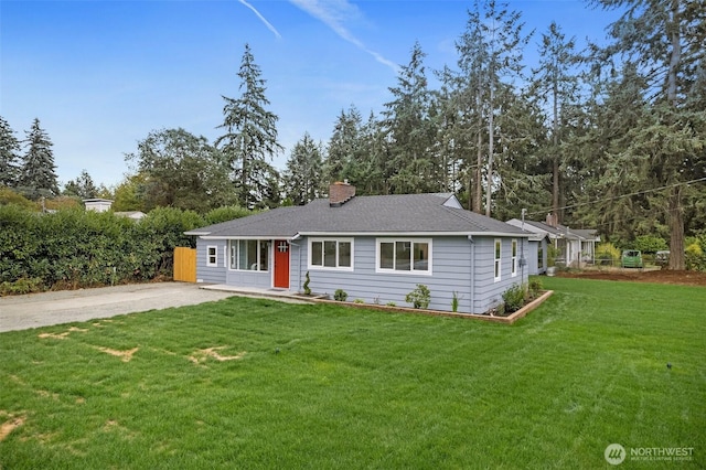 8206 N Way SW, Lakewood, WA 98498 - ranch-style house with a chimney, a front lawn, and a shingled roof