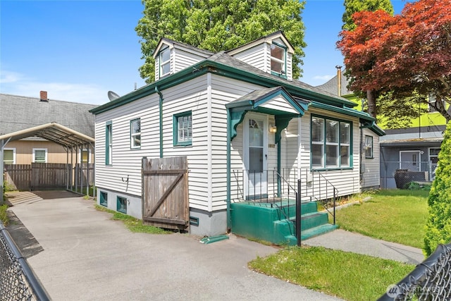 1810 8th St, Bremerton, WA 98337 - shotgun-style home with a carport and driveway