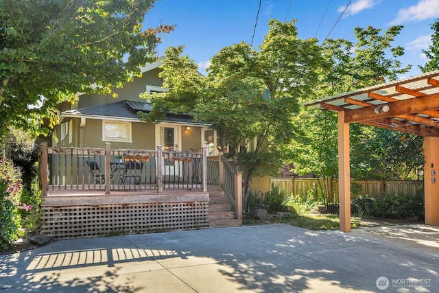 5521 34th Ave NE, Seattle, WA 98105 - gate featuring a pergola, a patio area, and a wooden deck