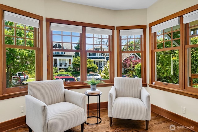 5521 34th Ave NE, Seattle, WA 98105 - living area with baseboards and wood finished floors