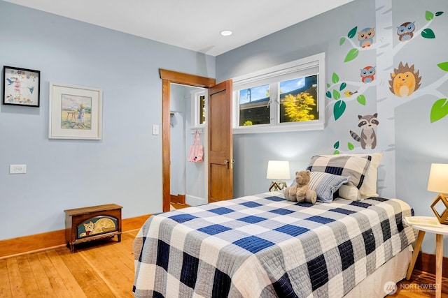 5521 34th Ave NE, Seattle, WA 98105 - bedroom featuring light wood-style flooring and baseboards