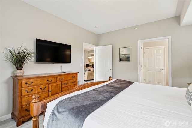 262 Oyhut Bay Blvd SW Unit 101, Ocean Shores, WA 98569 - bedroom with baseboards and light wood-style floors