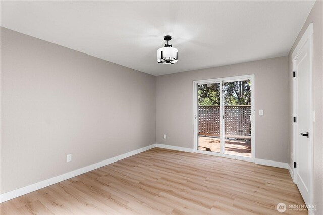 3801 Ruddell Rd SE, Lacey, WA 98503 - empty room featuring light wood-style floors and baseboards