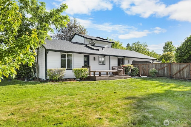 3801 Ruddell Rd SE, Lacey, WA 98503 - rear view of house with roof with shingles and an attached garage